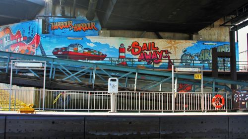 graffiti in harbor painting cheesy