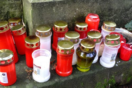 grave lights candles all saints