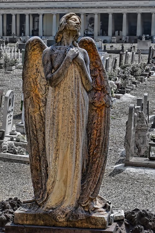 grave monument  angel figure  cemetery