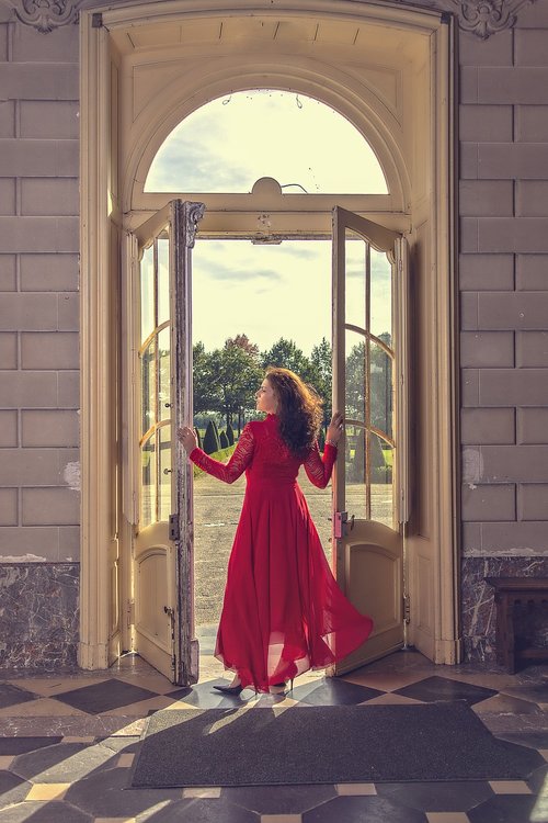 great doors  castle  lady in red