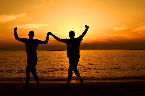 greek dancing at sunset seascape sunset