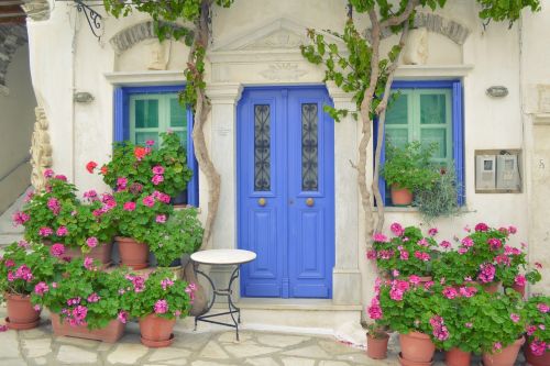 greek island door tinos island pyrgos dor with flowers