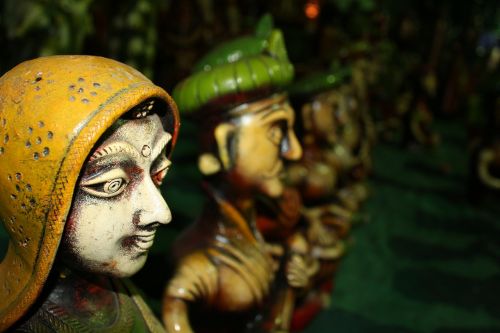 green ceramic statue
