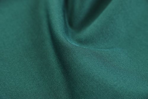 green fabric textile