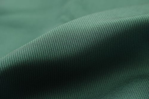 green fabric textile