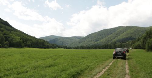 green car road trip