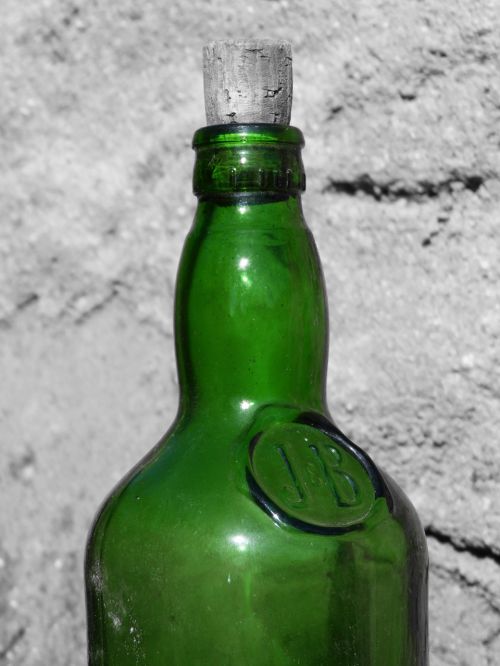 green bottle cap old bottle