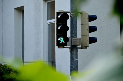 green traffic light traffic lights footbridge