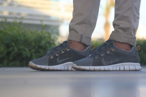 grey nike shoes