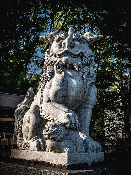 guardian dogs  stone statues  shrine
