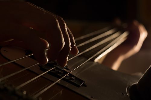 guitar string hand