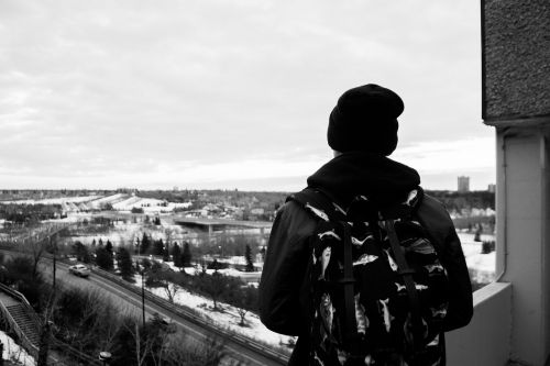 guy backpack hat