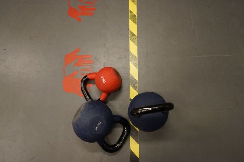 red dumbbells training