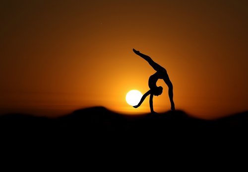 gymnast  sunset  silhouette