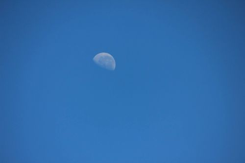 half moon blue sky