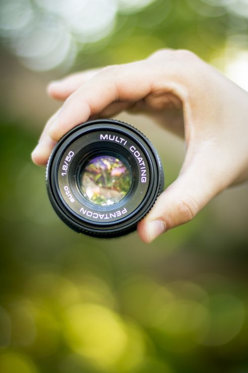 hand photographer lens