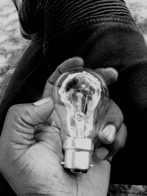 hand light bulb idea