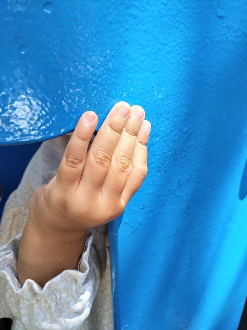 hand manicure little girl blue