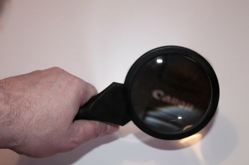 hand magnifying glass increase
