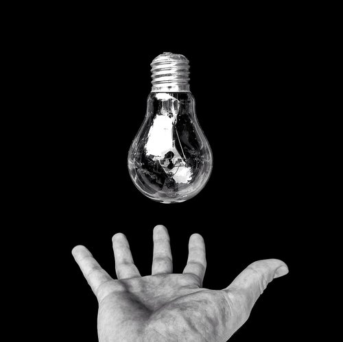 hand  light bulb  idea