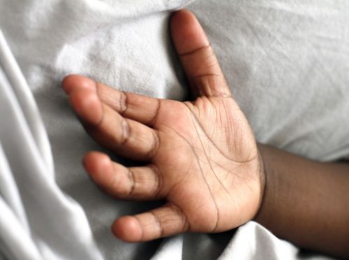 hand child black skin