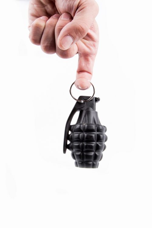Hand Holding A Grenade