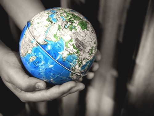 hands globe earth