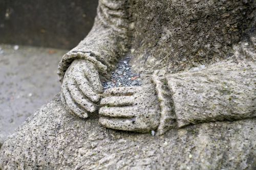 hands sculpture stone