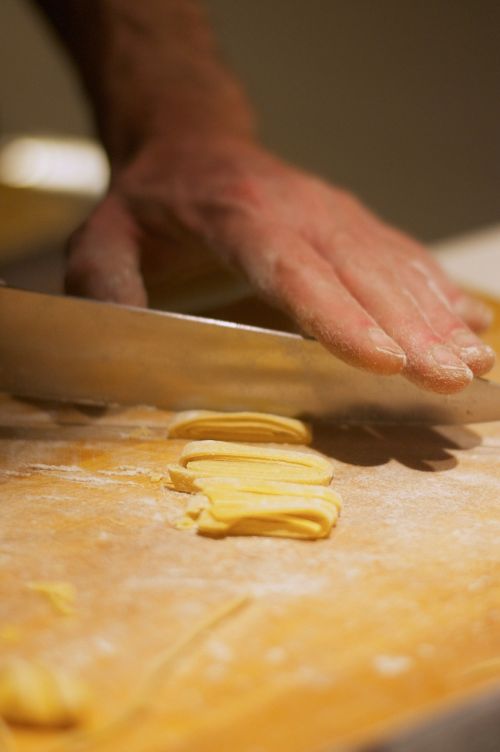hands pasta knead