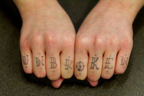 hands finger tatoo