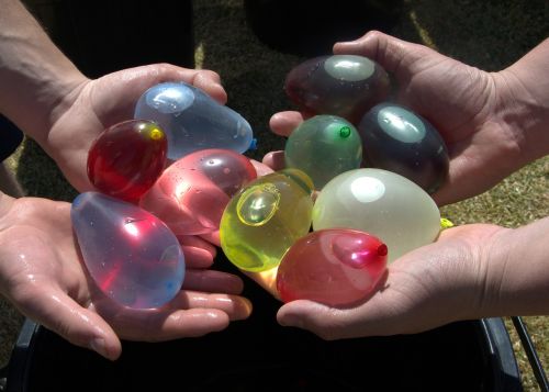 comparing water balloons colourful