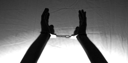 hands handcuffs tied up