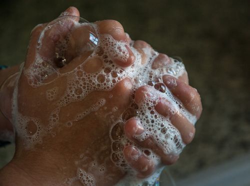 hands soap bubbles