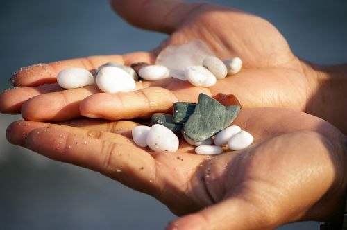 hands beach treasure