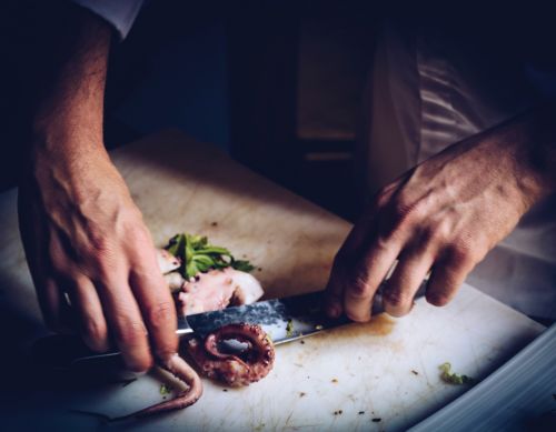 hands cutting cooking