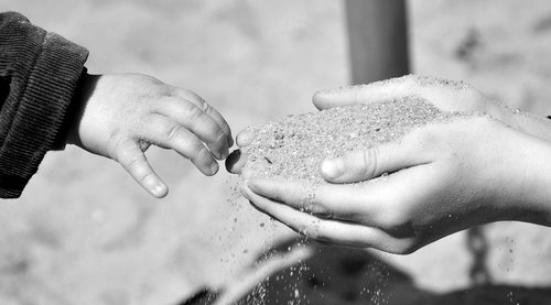 hands  children's hands  sand
