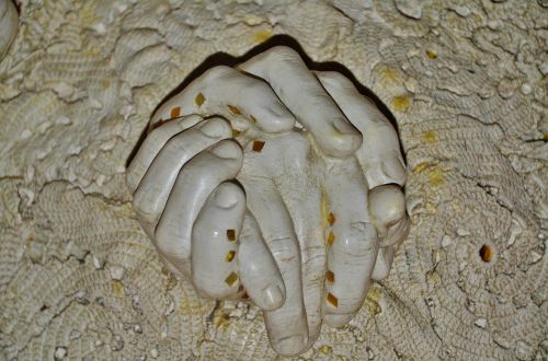 hands stone carving