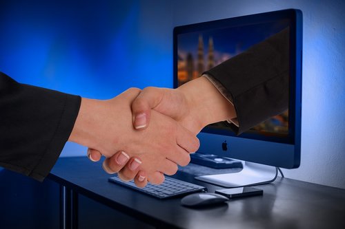 handshake  hands  monitor