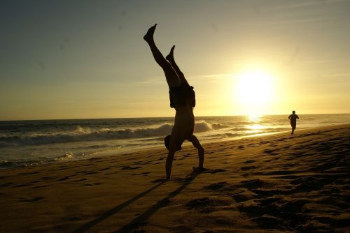 handstand beach water