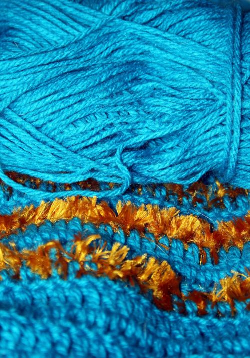 Handwork Of Turquoise And Gold Wool