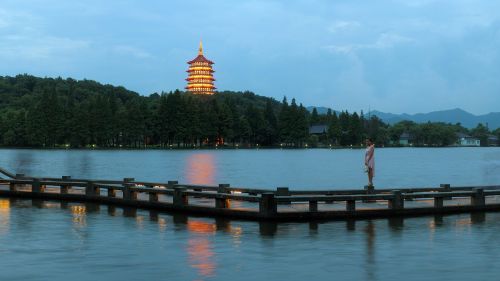 hangzhou west lake night leifeng pagoda lights west lake bridge park