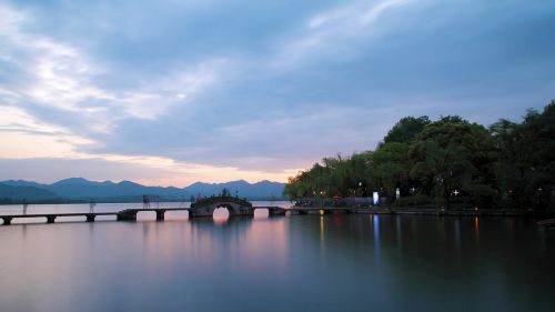 hangzhou xihu tiandi west arch sunset