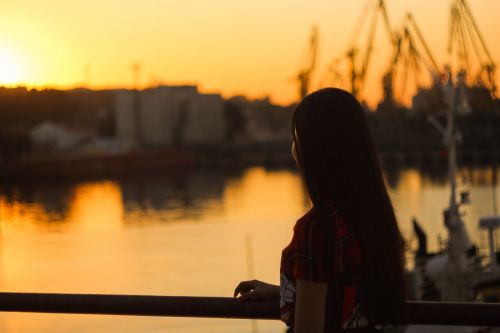 harbor sunset girl