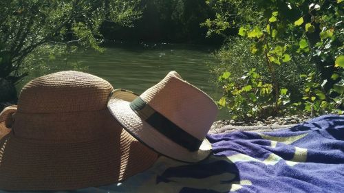 hat river sun