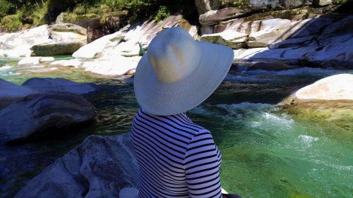 hat woman white water