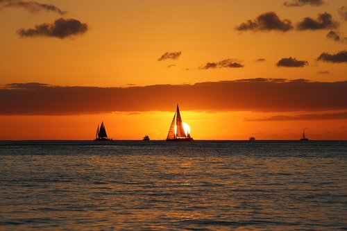 hawaii  sailing boat  sunset
