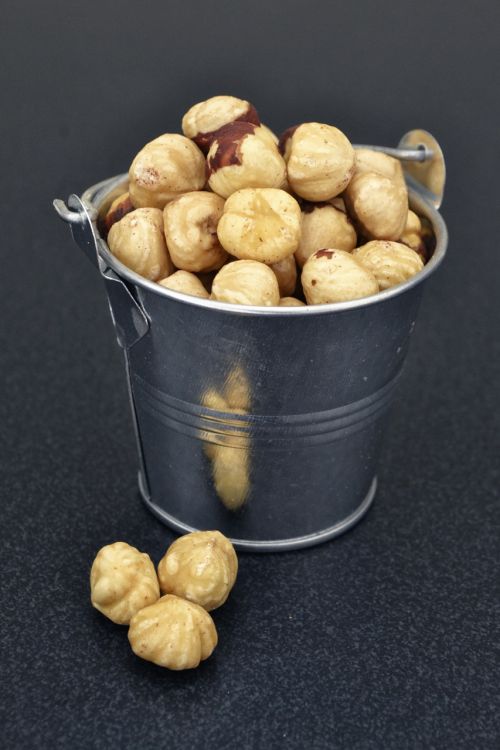 hazelnuts metallic bucket food food photography
