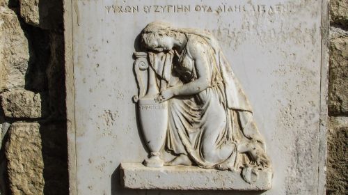 headstone sculpture greek sign