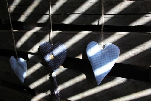 heart wooden wall shadow play