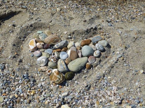 heart stones sand